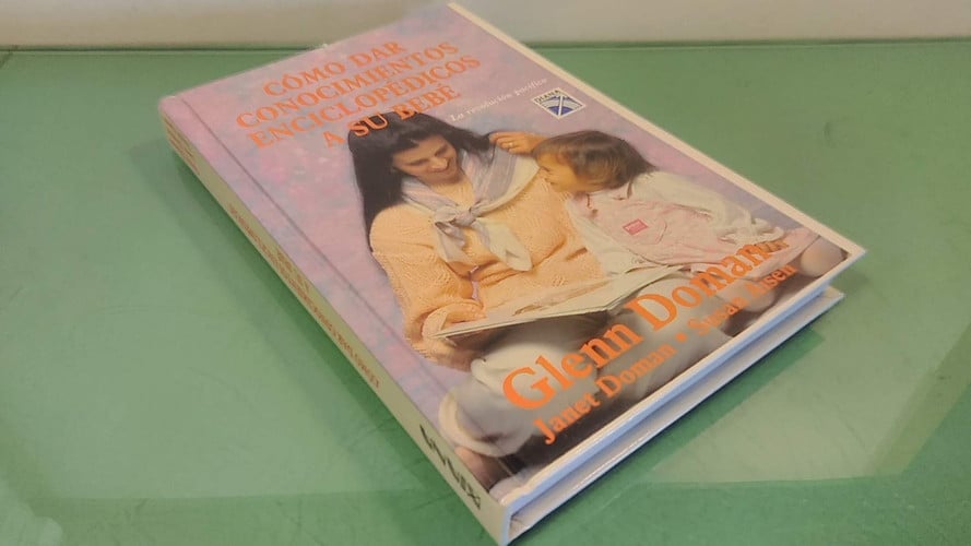 COMO DAR CONOCI.ENCIC.A SU BEBE, de DOMAN | portada del libro