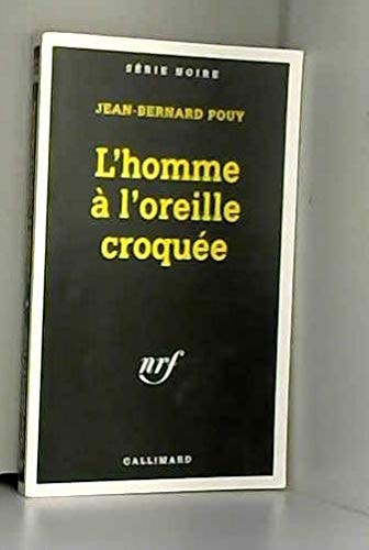 L'HOMME A L'OREILLE CROQUEE, de Jean-Bernard Pouy (romancier).) | portada del libro